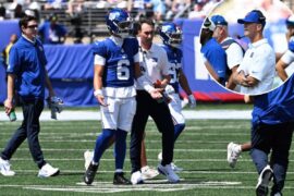 Giants’ John Harbaugh suspects ‘history’ informed Jaxson Dart’s latest medical tent visit