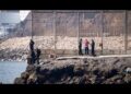 Spain mobilises troops as thousands swim across border from Morocco