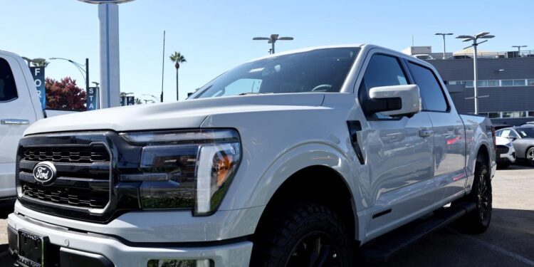 Ford recalls 223,000 F-150 trucks over detaching fuel tanks